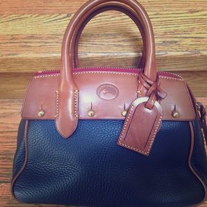 Dooney &Burke Mini Wilson Never used
